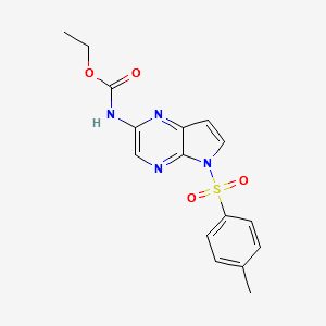 Carbamic acid,N-[5-[(4-methylphenyl)sulfonyl]-5H-pyrrolo[2,3-b]pyrazin-2-yl]-, ethyl este structure, CAS 1869118-24-0